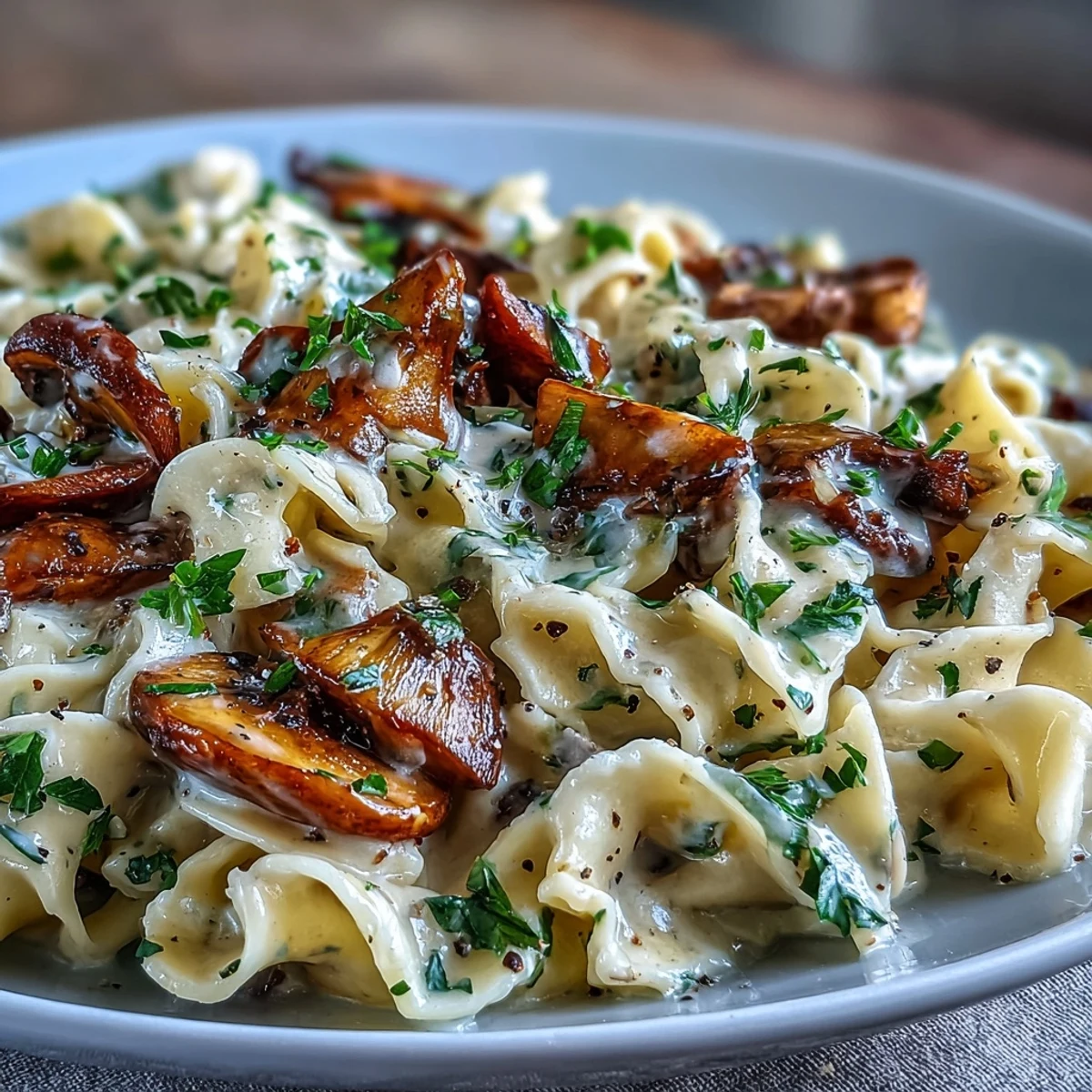 Steaming Creamy Mushroom Stroganoff serves up earthy mushrooms and tangy miso sauce, perfect for a cozy vegetarian pasta night.  