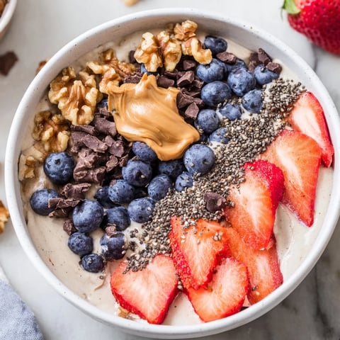 Creamy Protein Ice Cream Bowl with fresh berries: a cool, refreshing, high-protein dessert.